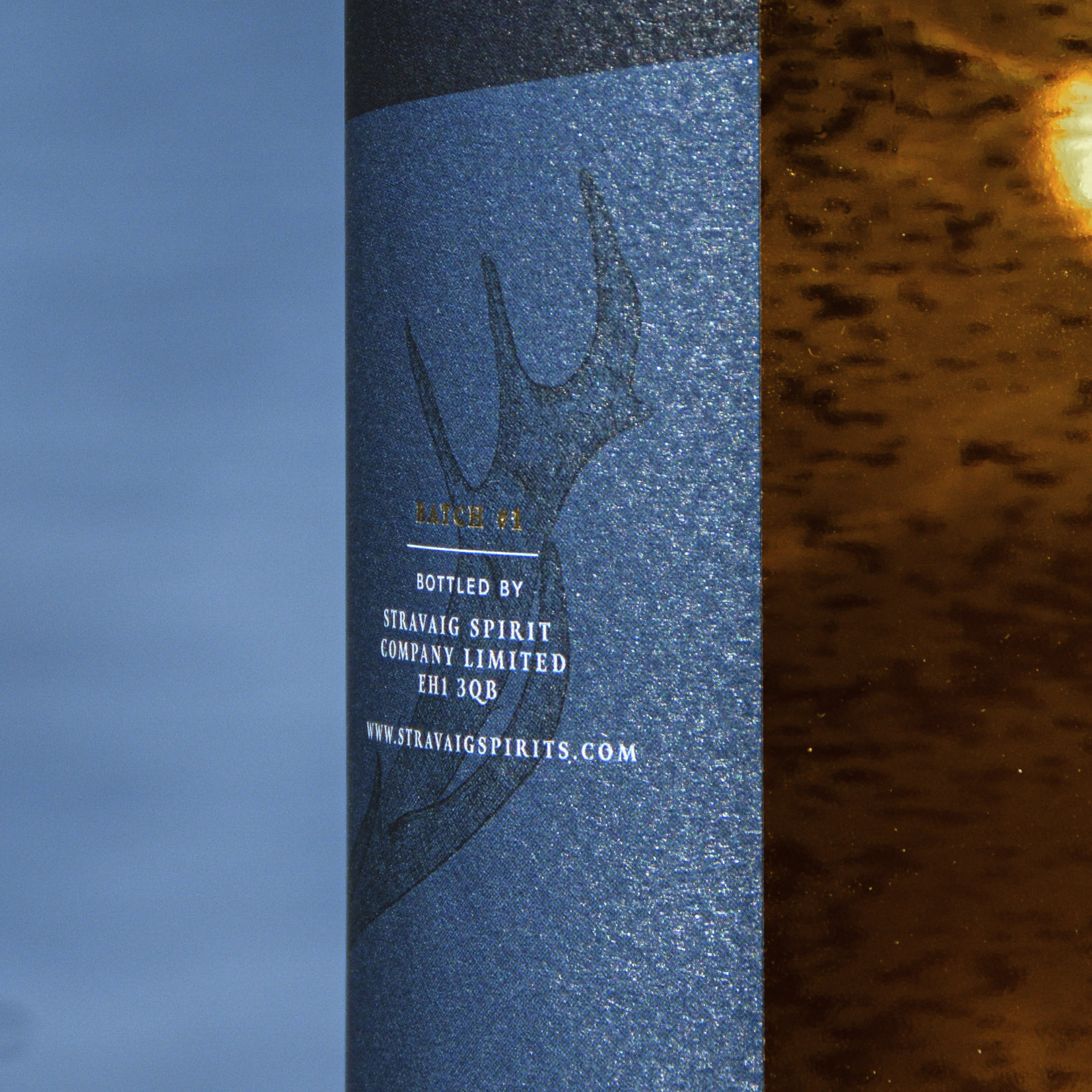 Bottled By Close Up Close-up of Glenlaird's whisky label showcasing a hand-illustrated crown with intricate details and gold foil printing, highlighting the luxurious and artisanal quality of the packaging design.